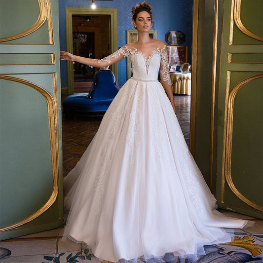 2021 New A-Line Wedding Dresses O Neck Three Quarter Sleeve Illusion Button Appliqued Beading Crystal Floor Length Bridal Gowns - LiveTrendsX