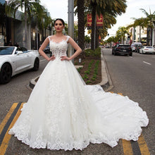 Load image into Gallery viewer, Pearls Appliques Flowers Gorgeous Ball Gown Wedding Dresses With Chapel Train Casamento See Through Sexy Bridal Dress Plus Size - LiveTrendsX
