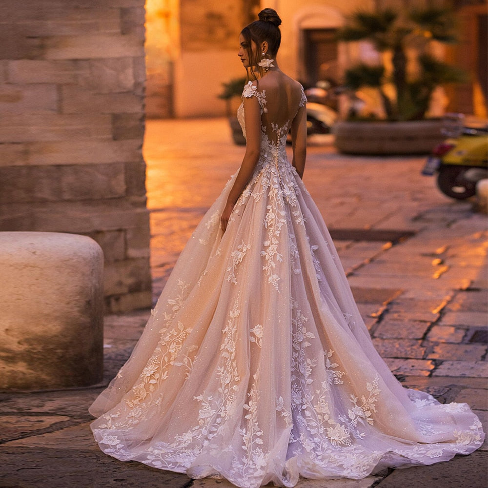 Pearls Appliques Lace Flowers Shiny Wedding Dresses  Vestidos De Novia O-neck Cap Sleeve Backless Bridal Gowns - LiveTrendsX