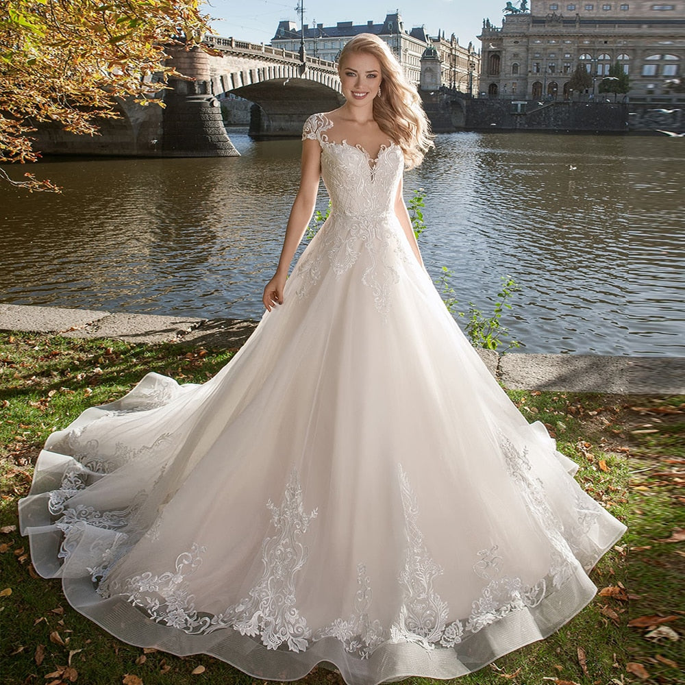 Princess A-line Wedding Dresses Vestido De Noiva Princesa O-neck Cap Sleeve Buttons Up Appliques Tulle Bridal Gowns Plus Size - LiveTrendsX