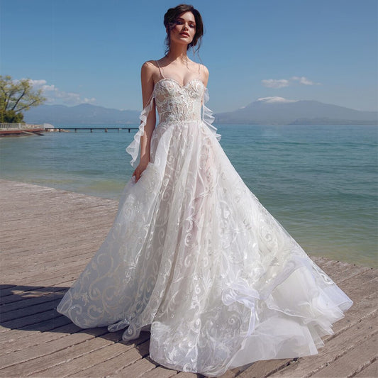 2021 New Sexy Sweetheart Backless Spaghetti Straps Tulle A-Line Wedding Dresses Appliqued Sequined Crystal Pearls Bridal Gowns - LiveTrendsX