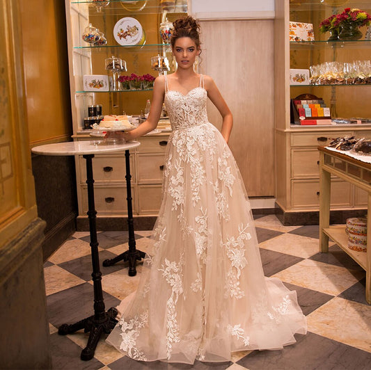 2021 New Sexy Sweetheart Backless Spaghetti Straps A-Line Wedding Dresses Appliqued Beading Crystal Floor Length Bridal Gowns - LiveTrendsX