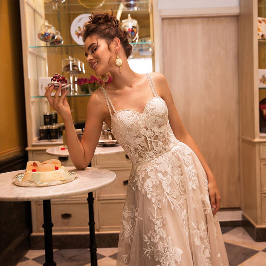 2021 New Sexy Sweetheart Backless Spaghetti Straps A-Line Wedding Dresses Appliqued Beading Crystal Floor Length Bridal Gowns - LiveTrendsX