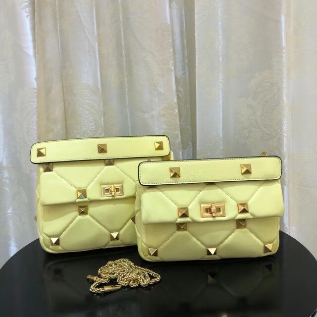 leather luxury rivet handbag