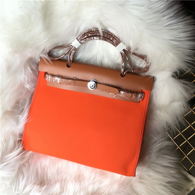 新しいファッションレザーとキャンバスのレディースバッグ