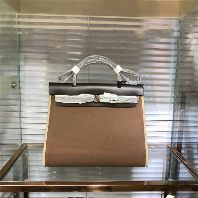 新しいファッションレザーとキャンバスのレディースバッグ