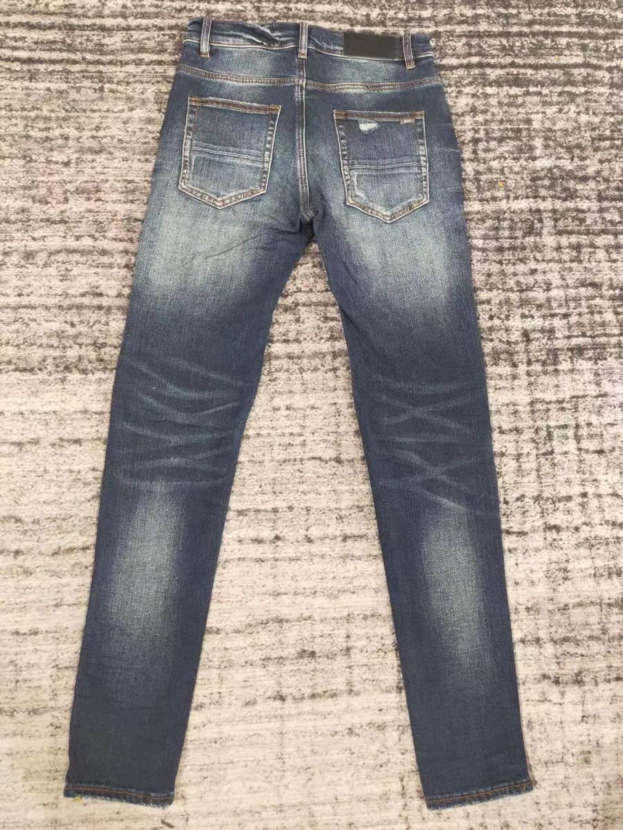 men leather patch distressed indigo jeans