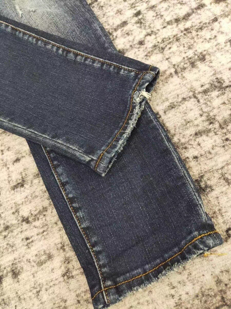men leather patch distressed indigo jeans