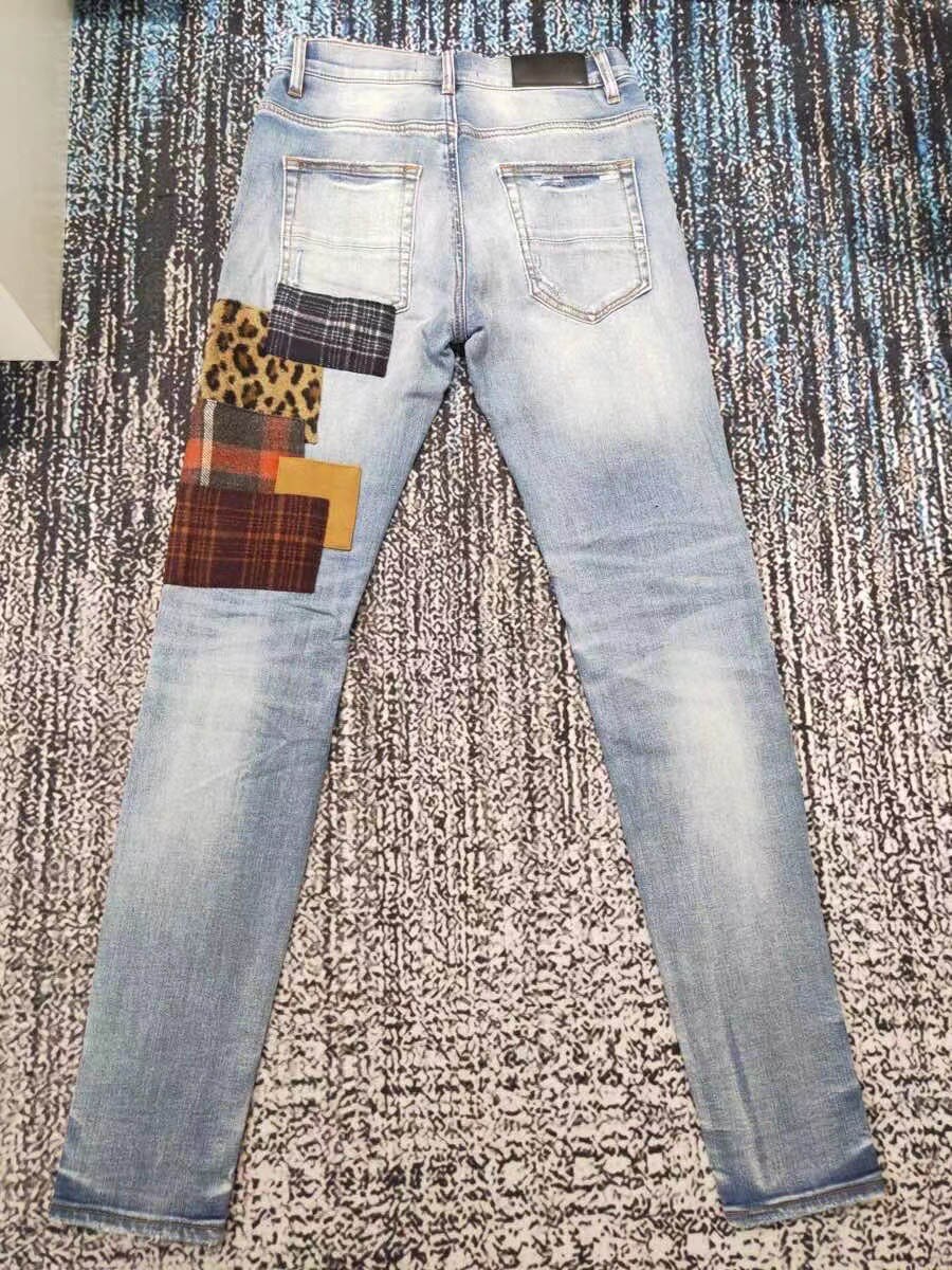 men art patches distressed blue jeans